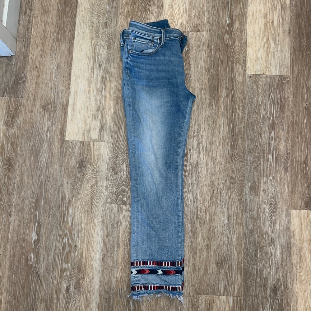Jeans with stitched pattern on bottom